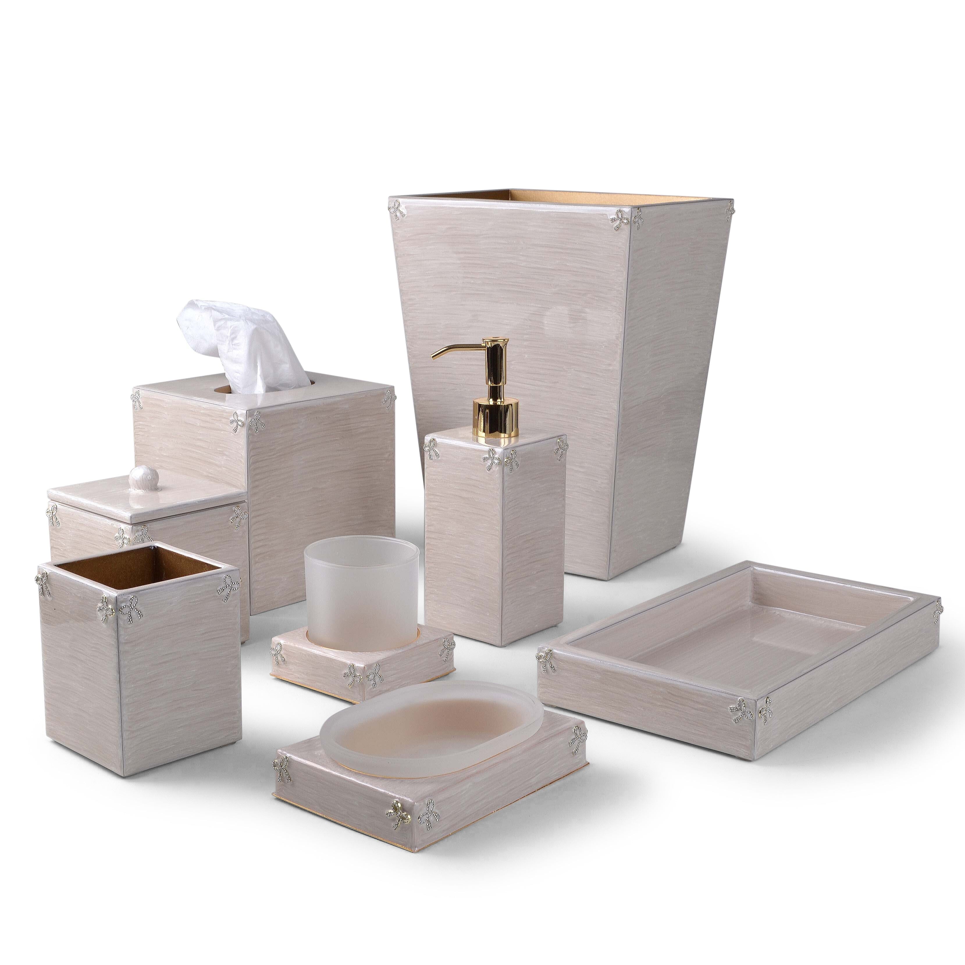 Bows add a playful accent to the Lola bath accessories. Each piece embedded with pave crystal bows.