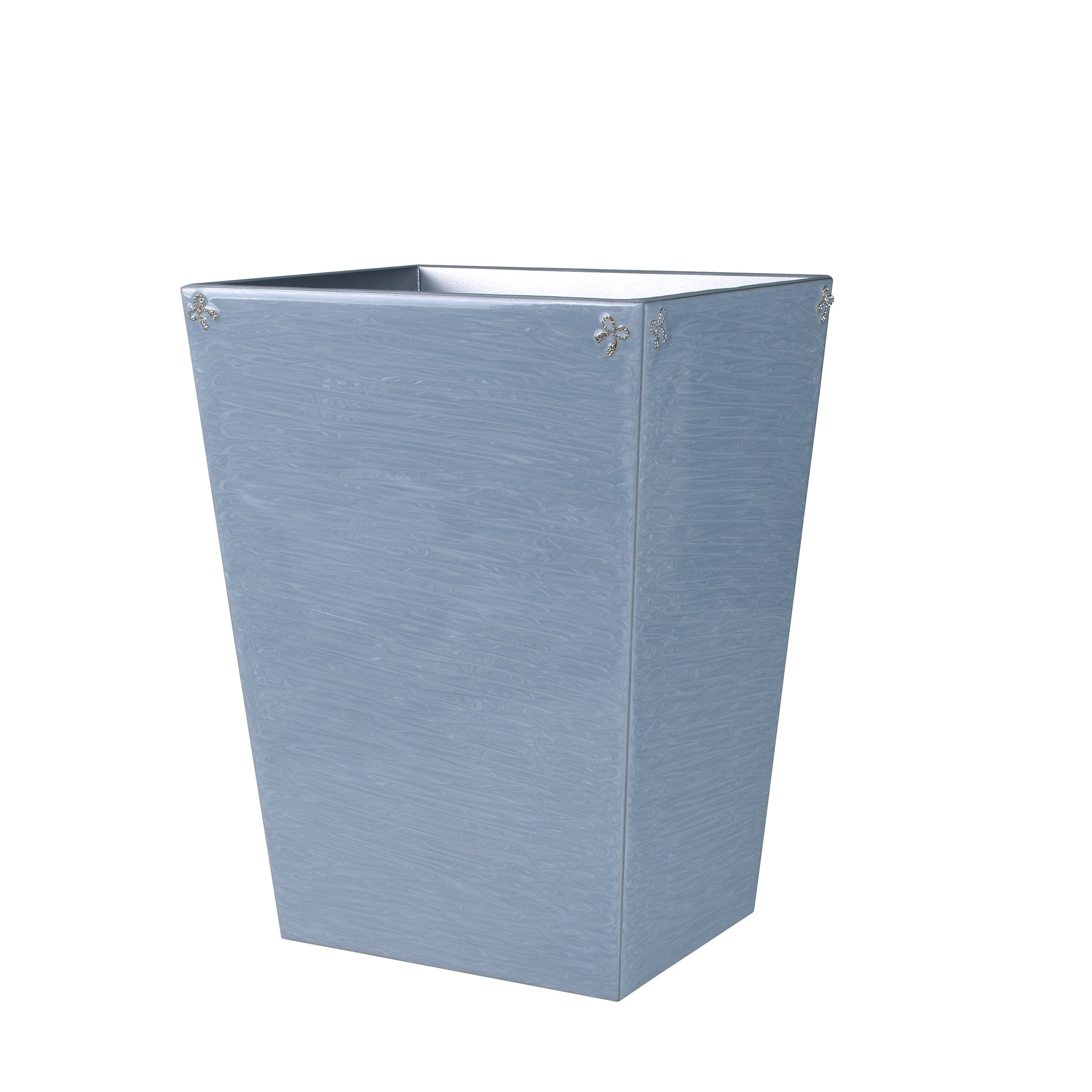 Straight wastebasket featuring hand set crystal bows and reusable liner.
