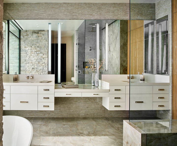 Beige marble bathroom with Mike + Ally bath accessories