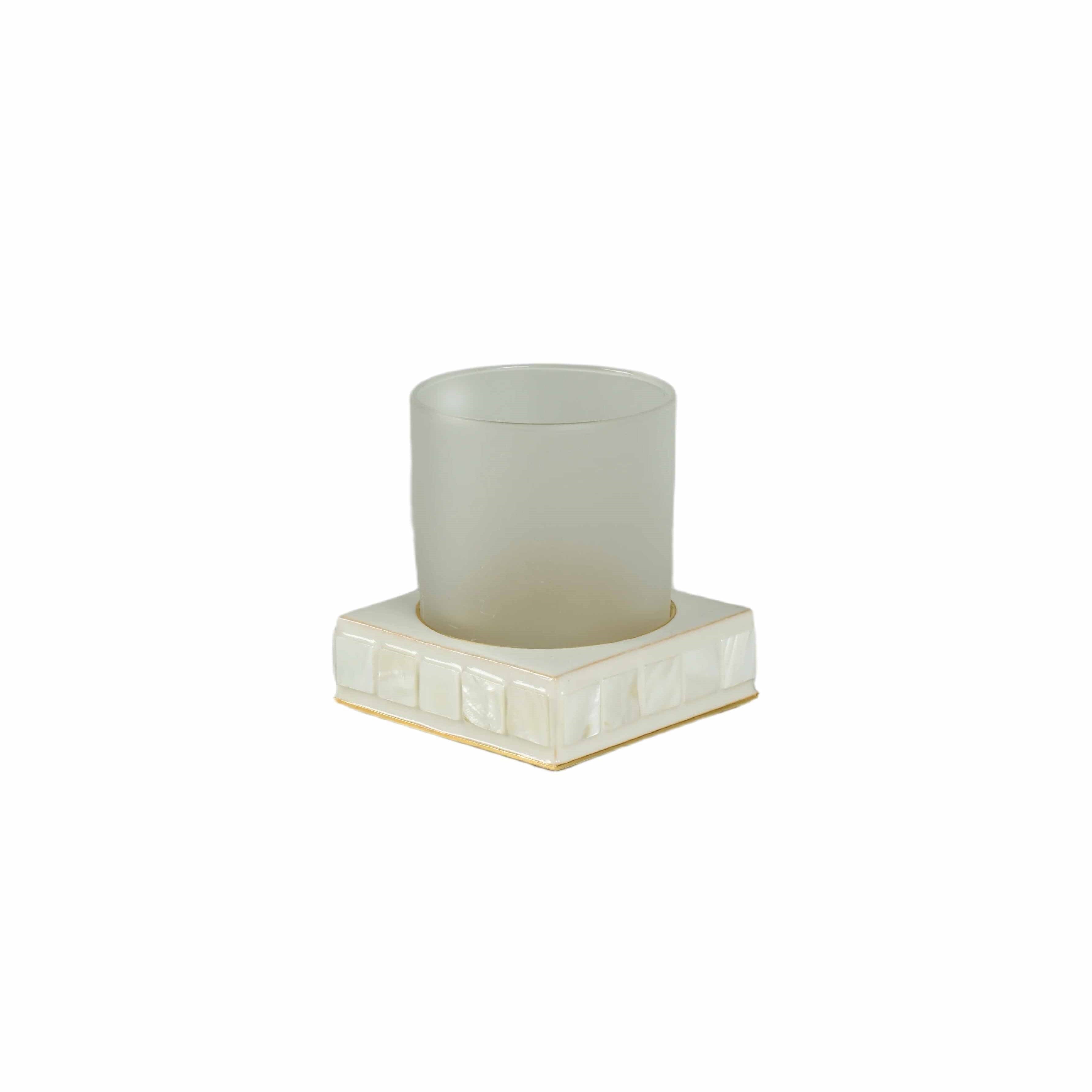 Glass tumbler with riverstone base