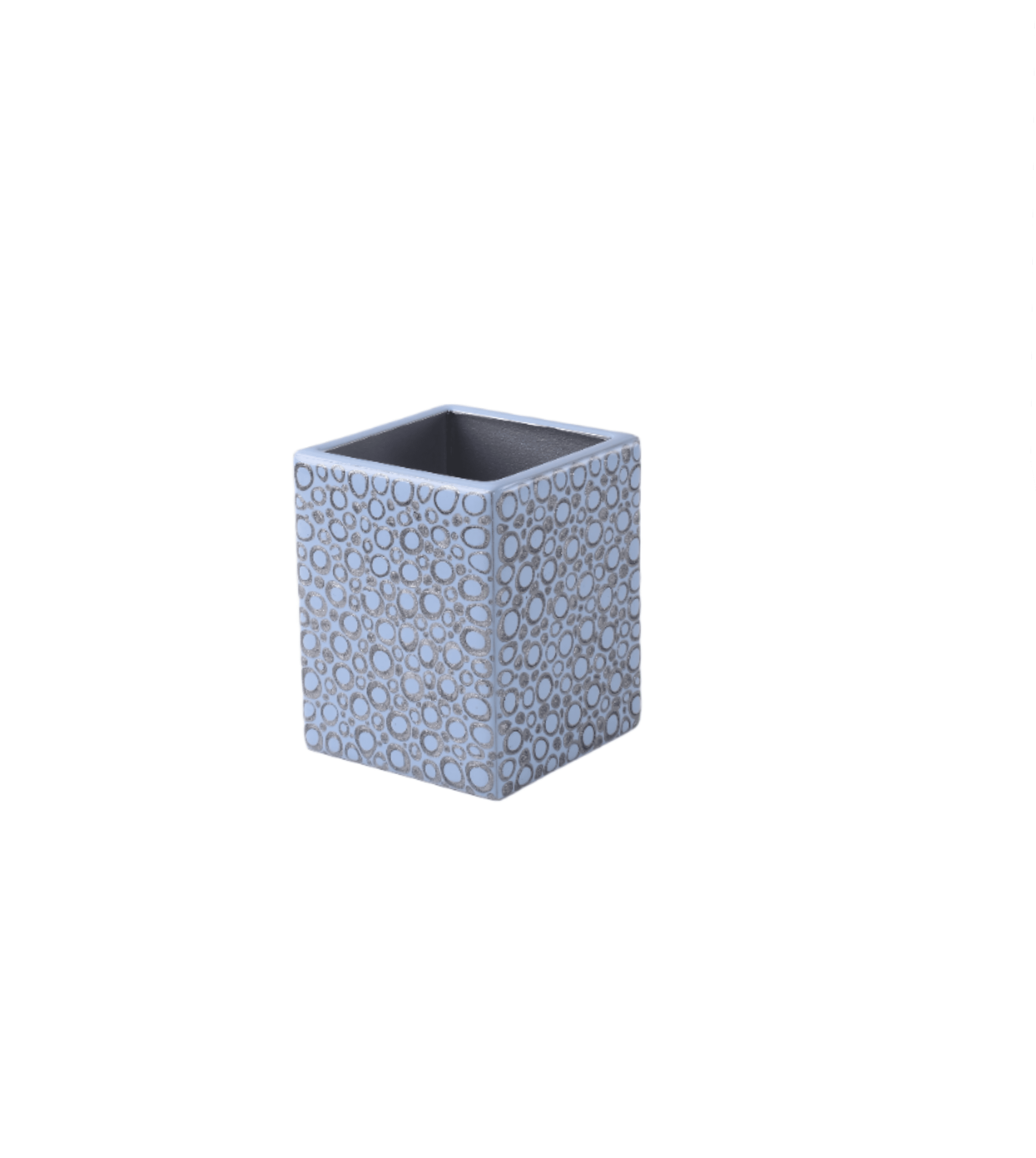 brush holder with abstract dot pattern