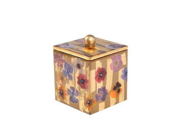 Container with lid decorated with wild flowers on gold.
