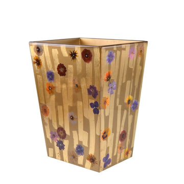 Straigt wastebasket adorned with wildflowers on gold