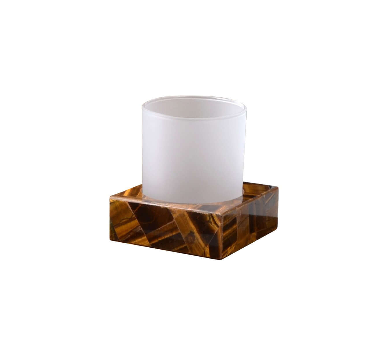 Tiger Eye gemstone placed in a random pattern. Glass tumbler for drinking or brushes