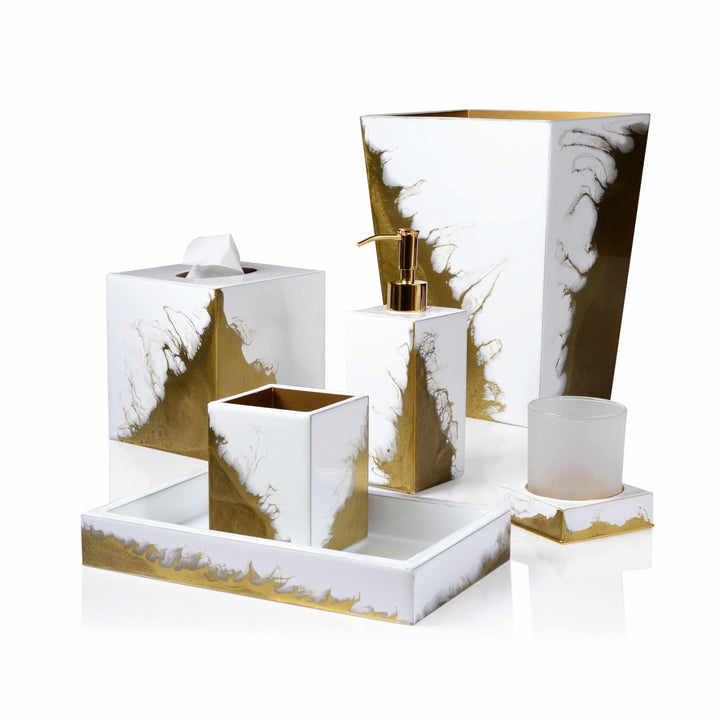 An energetic collection of bath accessories hand enameled in a metallic gold and white lava pattern.
