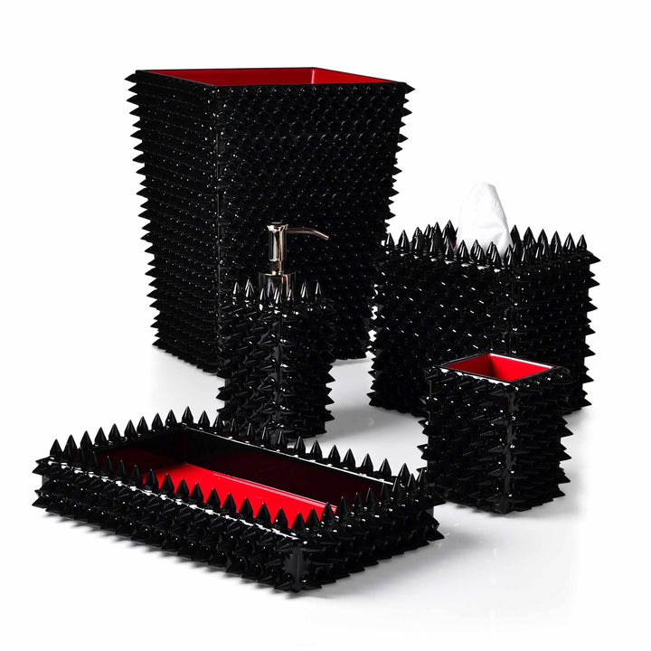 A fashion forward bath accessory set covered in black spikes with an accent or red enamel