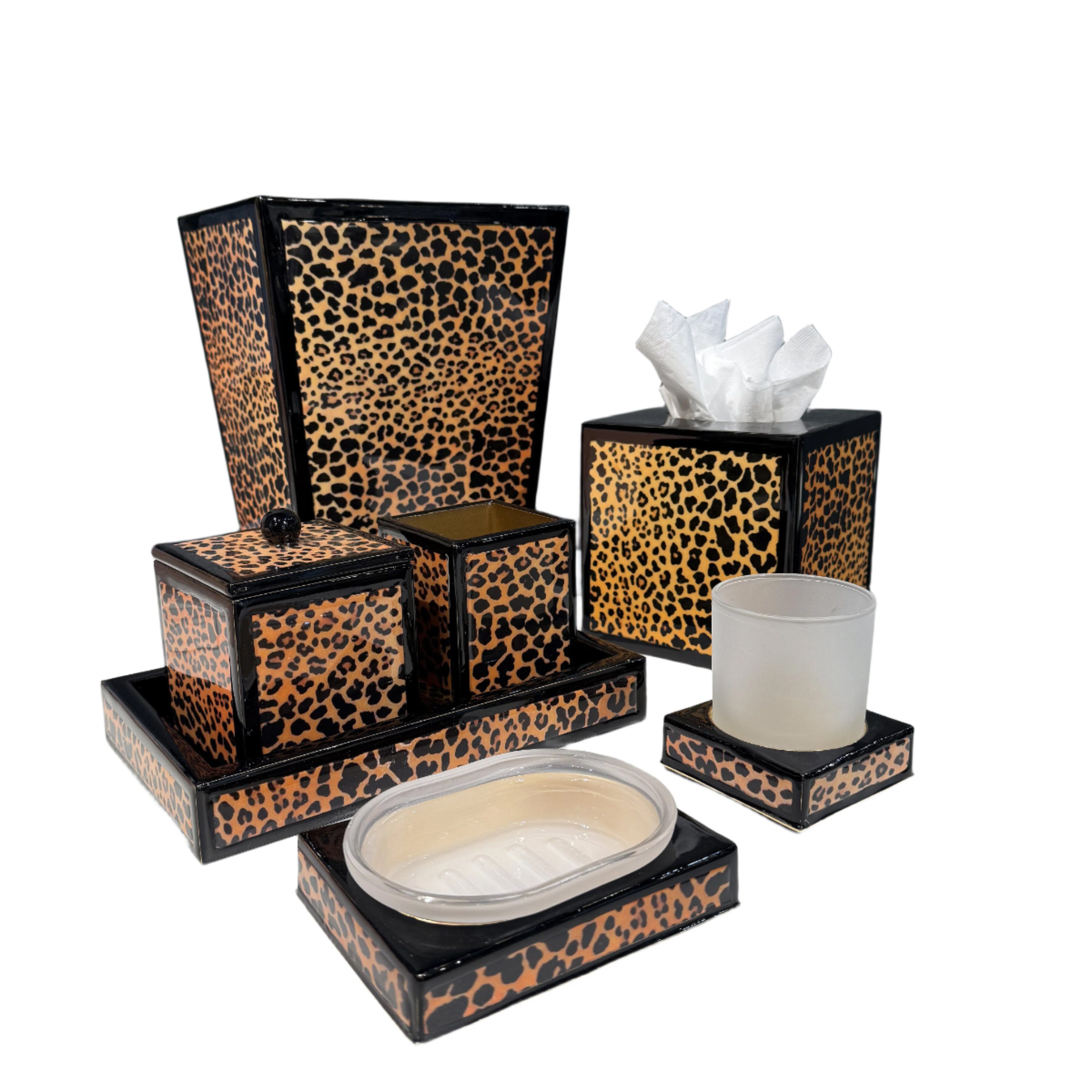Leopard print bathroom accessory set.