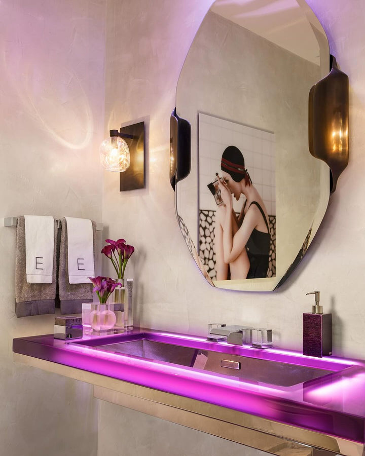 Modern bathroom vanity with purple Mike + Ally bath accessories