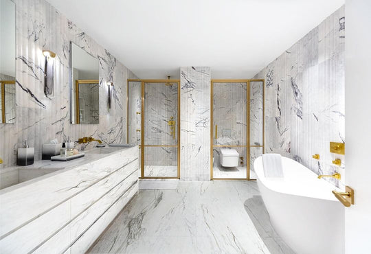 White marble luxury bathroom with Mike + Ally Ombre bath set