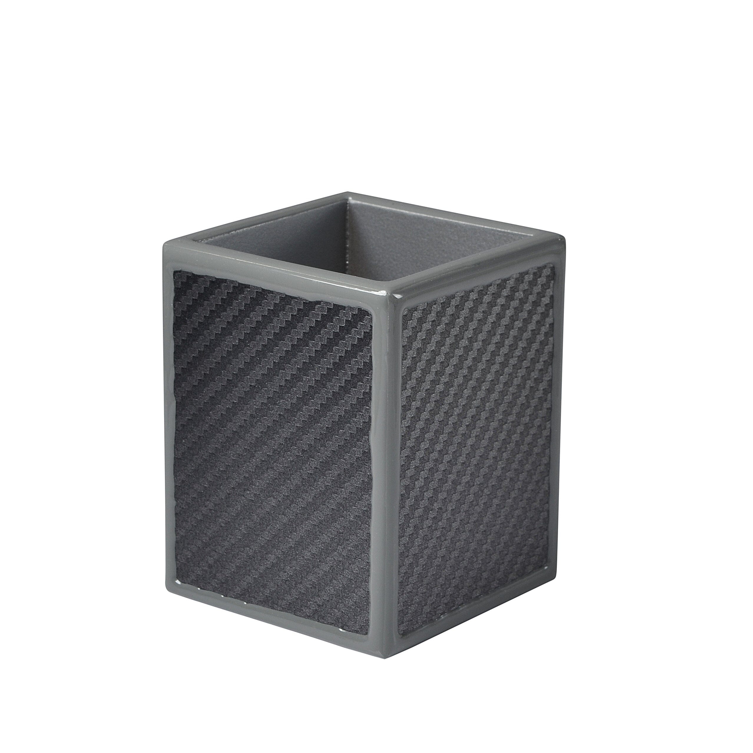 Cube-shaped brush holder with carbon fiber pattern on a white background