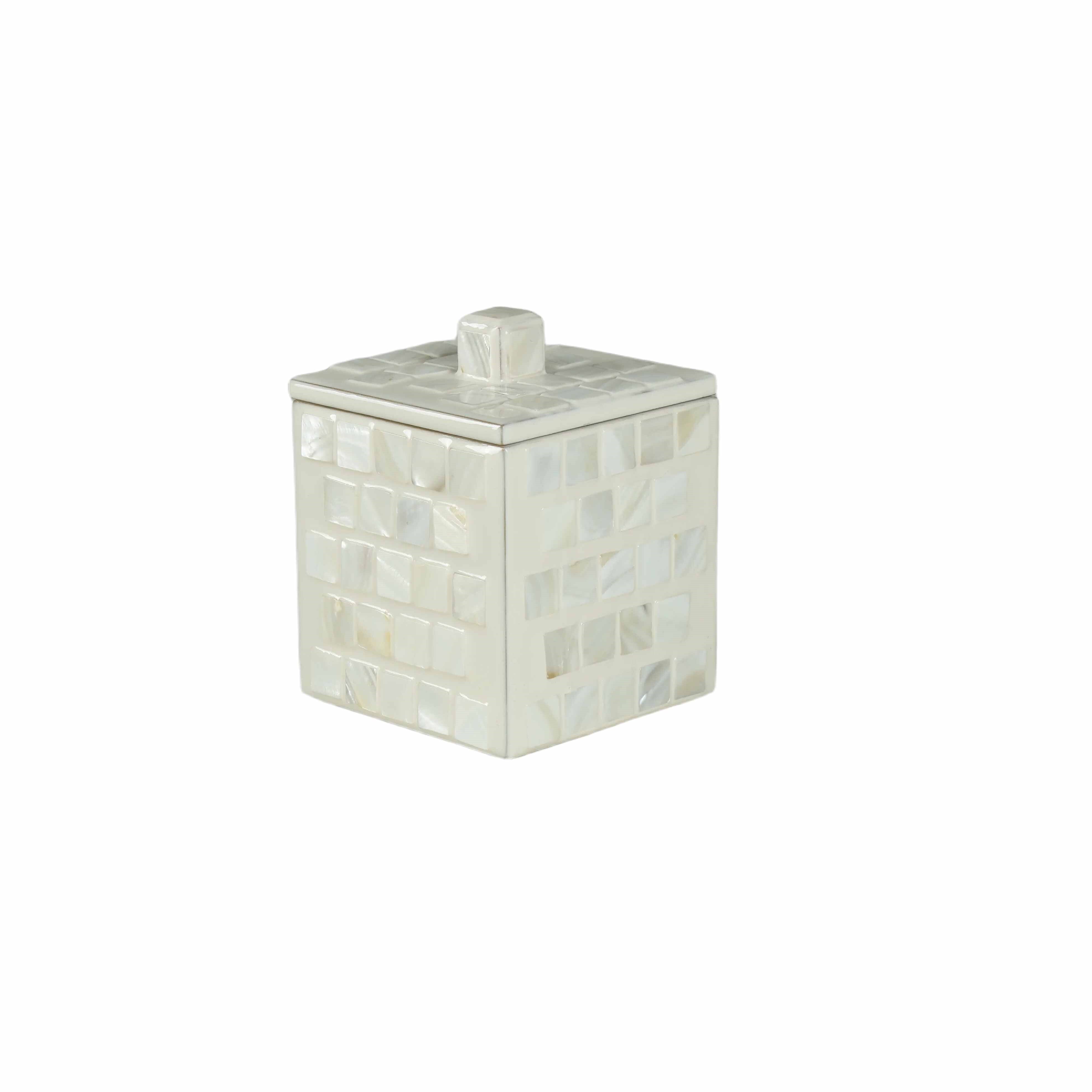 container with lid decorated with river stones