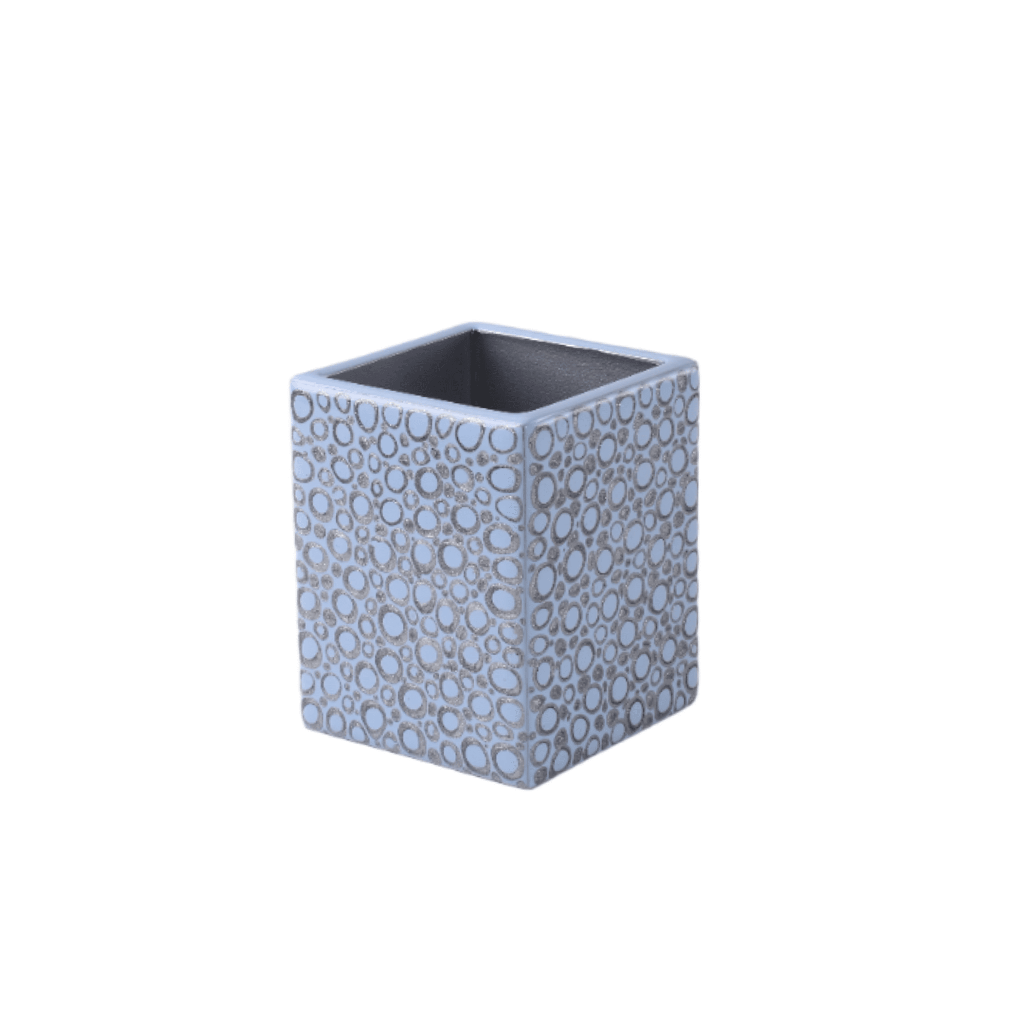 brush holder with abstract dot pattern
