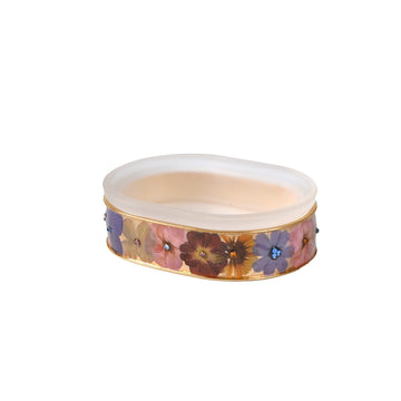 Oval glass soap dish adorned with wildflowers.
