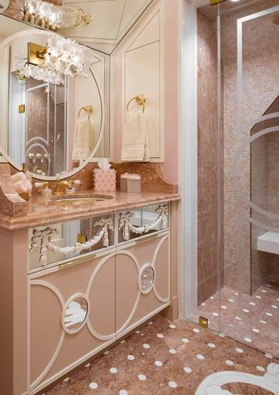 Opulent bathroom interior with pink Mike + Ally Roxy Collection