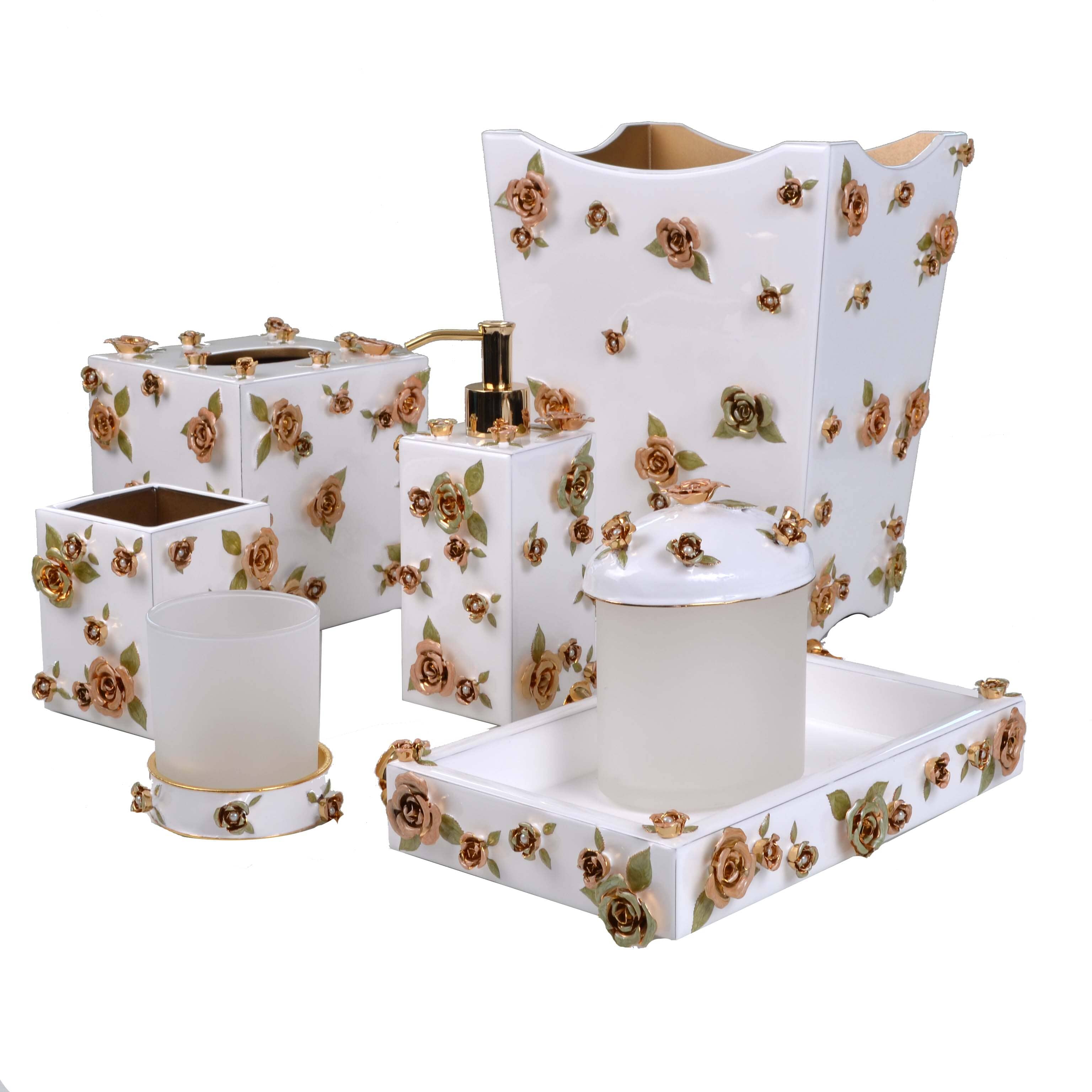 Bathroom accessory set with floral design on a white background